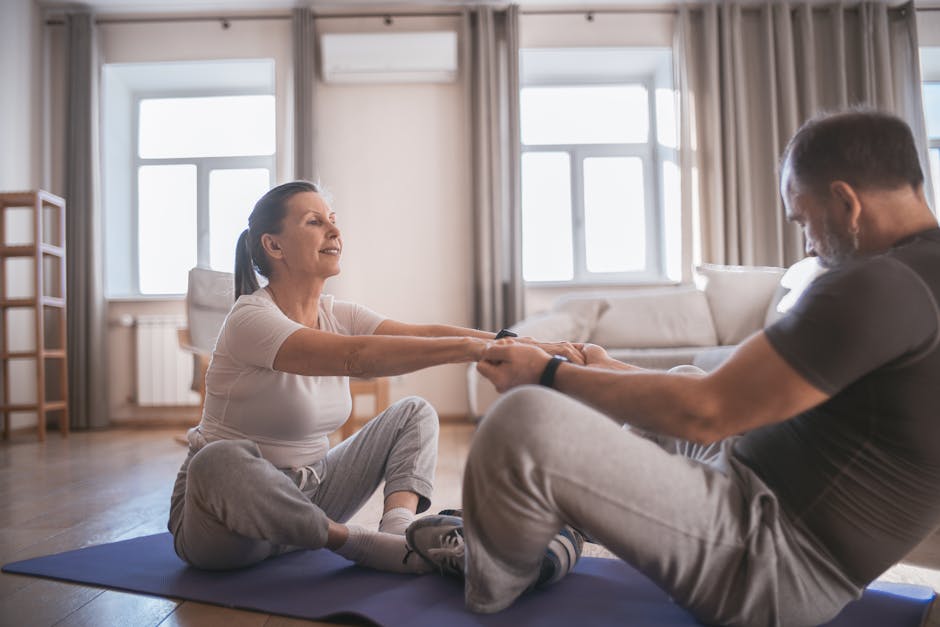 Elderly couple practicing stretching exercises together indoors, fostering health and wellness.
